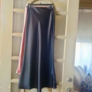 2 satin skirts, pink, and black.